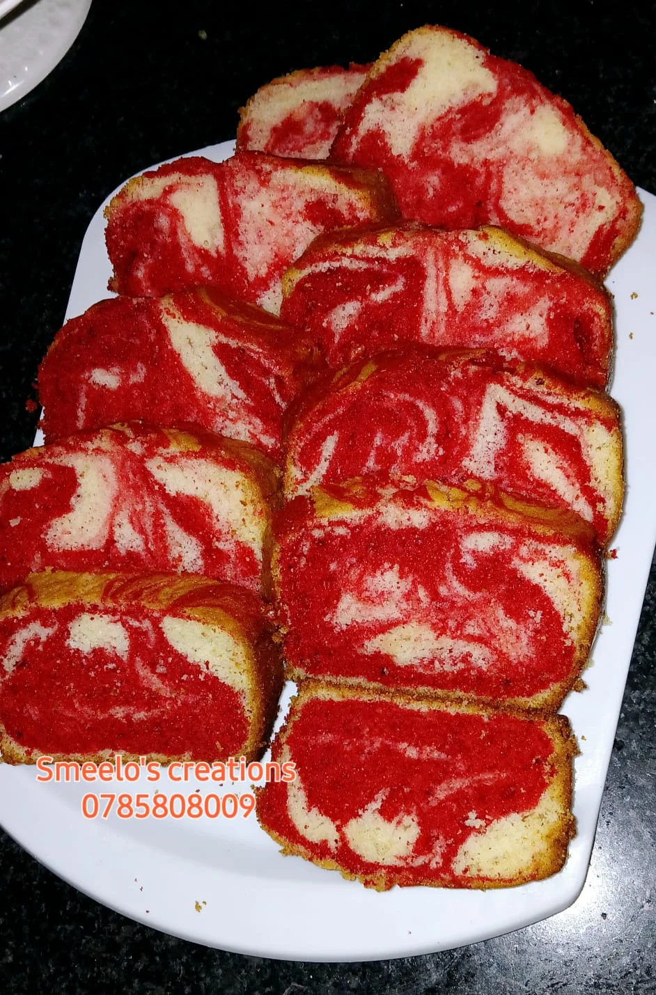 Slices of marble red velvet and vanilla loaf cake